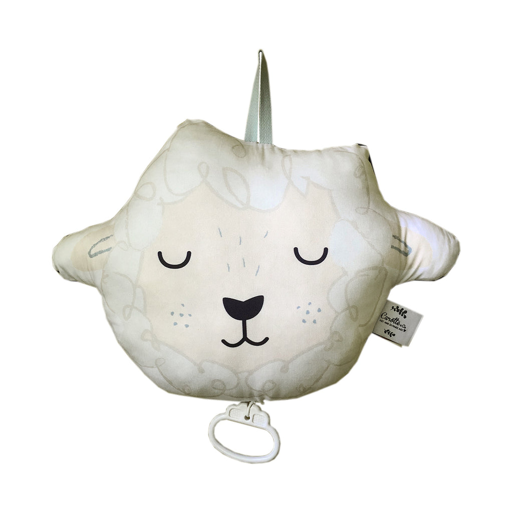 coussin musical illustré motif exclusif tête de mouton blanc et bleu marine Carotte & Cie
